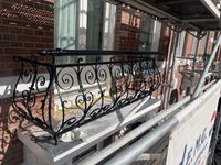 Balkonhekwerk grachtenpand Amsterdam gerestaureerd